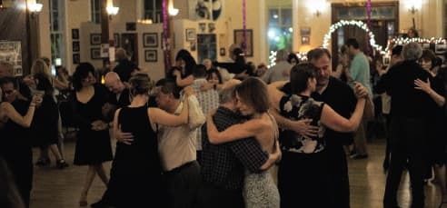 Dancers at a Tango Mercurio milonga